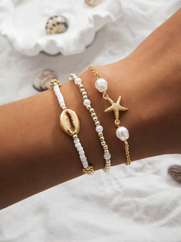 Beachy Metal Anklet Set with Starfish & Shell Beads for Women, Glass Summer Accessories – Ideal for gifting, travel accessories, romantic occasions, casual style, or everyday use with elegant minimalist charm.
